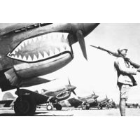 iCanvas A Chinese Soldier Guards A Line Of American P-40 Fighter Pla by Stocktrek Images - Canvas Print