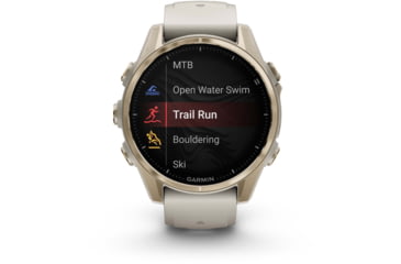 Image of Garmin fenix 8 AMOLED 43mm GPS Watch, Sapphire, Soft Gold with Fog Gray/Dark Sandstone Silicone Band, 010-02903-10